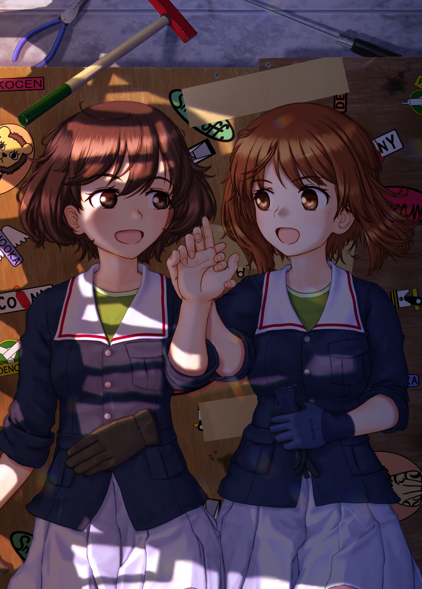 2girls absurdres akiyama_yukari bangs black_gloves blue_jacket brown_eyes brown_hair commentary_request emblem girls_und_panzer gloves gloves_removed green_shirt hammer highres holding_hands jacket leopon_(animal) long_sleeves looking_at_another lying messy_hair military military_uniform miniskirt multiple_girls mushinosuke nishizumi_miho on_back ooarai_military_uniform open_mouth partial_commentary pleated_skirt pliers shirt short_hair single_glove skirt smile uniform white_skirt yuri