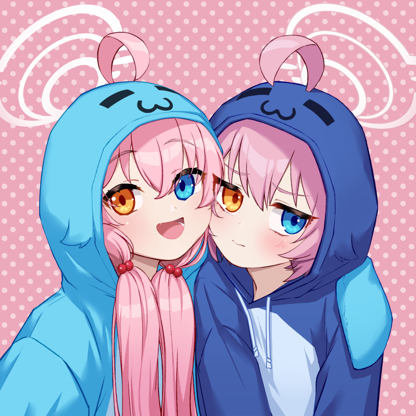 2girls :3 absurdres ahoge arm_around_shoulder bangs blue_archive blue_eyes blue_hoodie fang hair_between_eyes halo heterochromia highres hood hoodie hoshino_(blue_archive) long_hair looking_at_viewer looking_away low_twintails multiple_girls open_mouth pink_hair polka_dot polka_dot_background sjuno twintails yellow_eyes younger