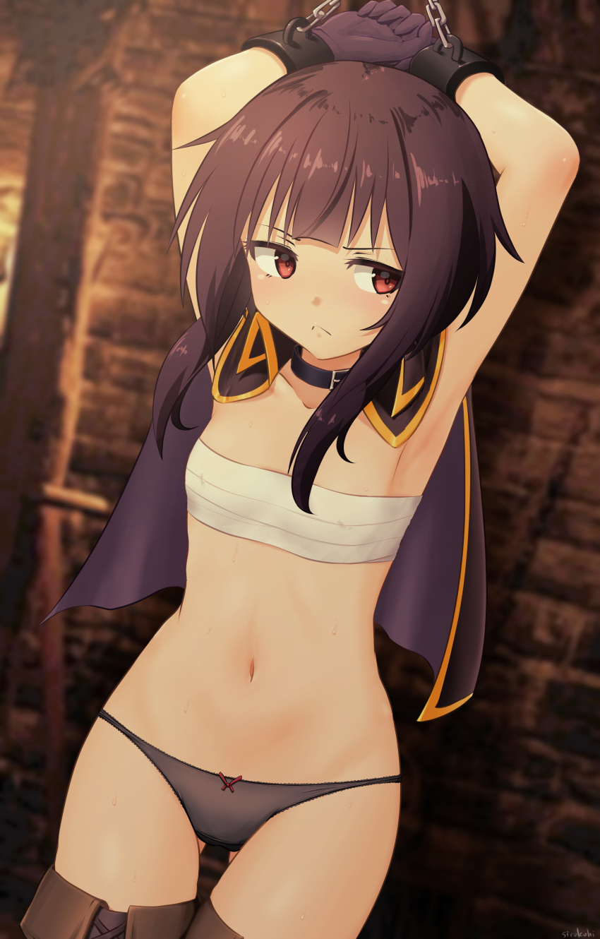 1girl absurdres arms_up bangs black_capelet black_choker black_gloves black_panties blurry blurry_background breasts capelet chain choker collarbone commentary_request covered_nipples cowboy_shot frown gloves highres indoors kono_subarashii_sekai_ni_shukufuku_wo! medium_hair megumin navel panties red_eyes restrained sarashi shiny shiny_hair sideways_glance sirokohi small_breasts solo stomach stone_wall underwear wall
