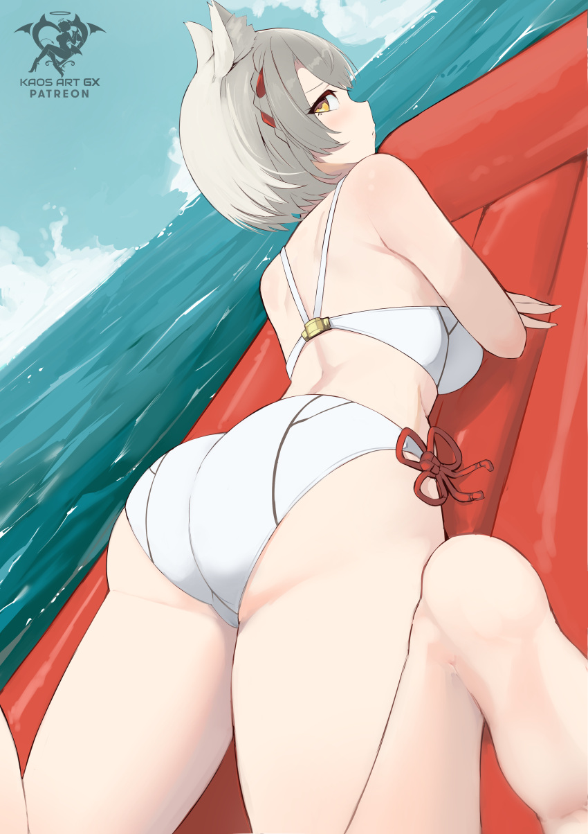 1girl absurdres adapted_costume animal_ears artist_name ass barefoot bikini cat_ears dutch_angle foreshortening grey_hair highres inflatable_raft kaos_art looking_at_viewer looking_back lying mio_(xenoblade) ocean on_stomach ribbon short_hair solo swimsuit thighs water white_bikini white_swimsuit xenoblade_chronicles_(series) xenoblade_chronicles_3 yellow_eyes