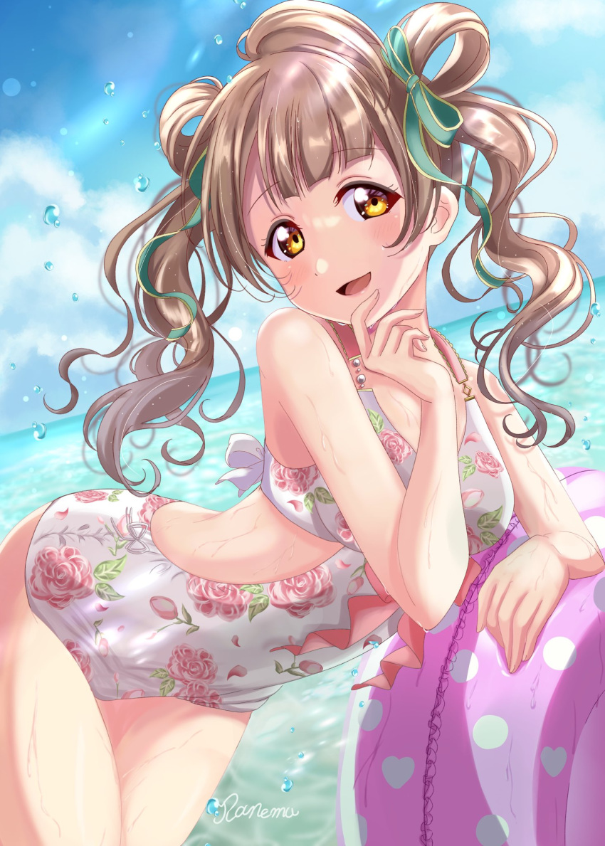 1girl alternate_hairstyle bangs bare_legs blue_sky blush bow breasts brown_hair cloud commentary english_commentary floral_print green_bow hair_bow hair_rings hand_on_own_chin highres innertube long_hair looking_at_viewer love_live! medium_breasts minami_kotori ocean one-piece_swimsuit one_side_up open_mouth outdoors polka_dot ranemu signature sky smile solo swimsuit twintails water_drop wavy_hair wet white_swimsuit yellow_eyes