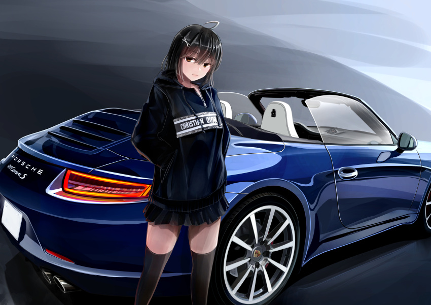3books absurdres ahoge bangs black_hair black_skirt black_thighhighs blue_hoodie brown_eyes car closed_mouth clothes_writing commentary_request convertible ground_vehicle hands_in_pockets head_tilt highres hood hoodie looking_at_viewer medium_hair motor_vehicle original porsche porsche_991 skirt smile sports_car standing thighhighs