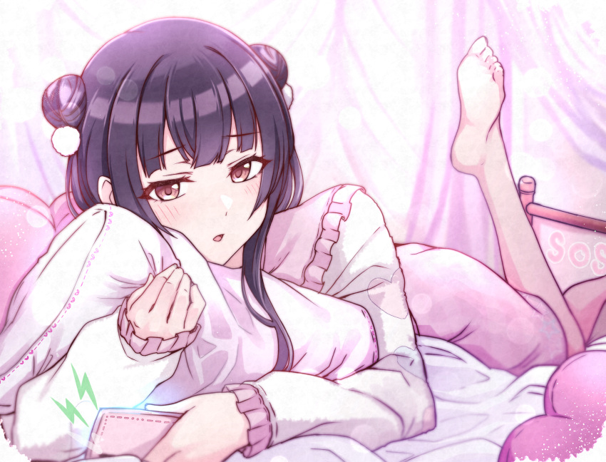 1girl bed black_hair brown_eyes cellphone commentary_request double_bun foot_up hair_bun highres holding holding_phone hugging_object idolmaster idolmaster_shiny_colors kusaka_io long_hair long_sleeves lying mayuzumi_fuyuko nightgown on_bed on_stomach parted_lips phone pillow pillow_hug pink_skirt skirt smartphone solo sweater white_sweater