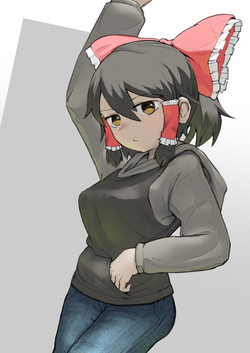 1girl absurdres arm_up bangs black_hair blue_pants bow breasts brown_eyes closed_mouth commentary cookie_(touhou) cowboy_shot denim expressionless frilled_bow frilled_hair_tubes frills grey_hoodie hair_between_eyes hair_bow hair_tubes hakonnbo hakurei_reimu highres hood hood_down hoodie jeans looking_at_viewer maru_(cookie) medium_breasts pants red_bow short_hair sidelocks solo touhou