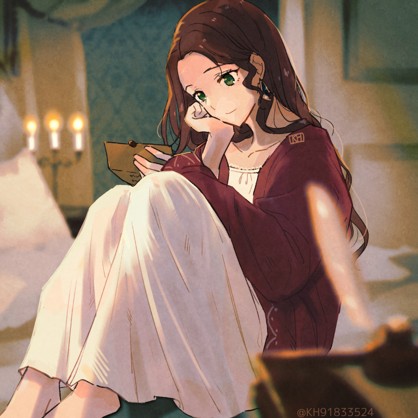 1girl bedroom blurry blurry_background brown_cardigan brown_hair candle cardigan closed_mouth collarbone dorothea_arnault dress earrings fire_emblem fire_emblem:_three_houses green_eyes head_rest highres holding holding_letter indoors jewelry kh_(tanakananataka) letter long_dress long_hair long_sleeves open_cardigan open_clothes reading shiny shiny_hair sleeves_past_wrists smile solo straight_hair twitter_username white_dress