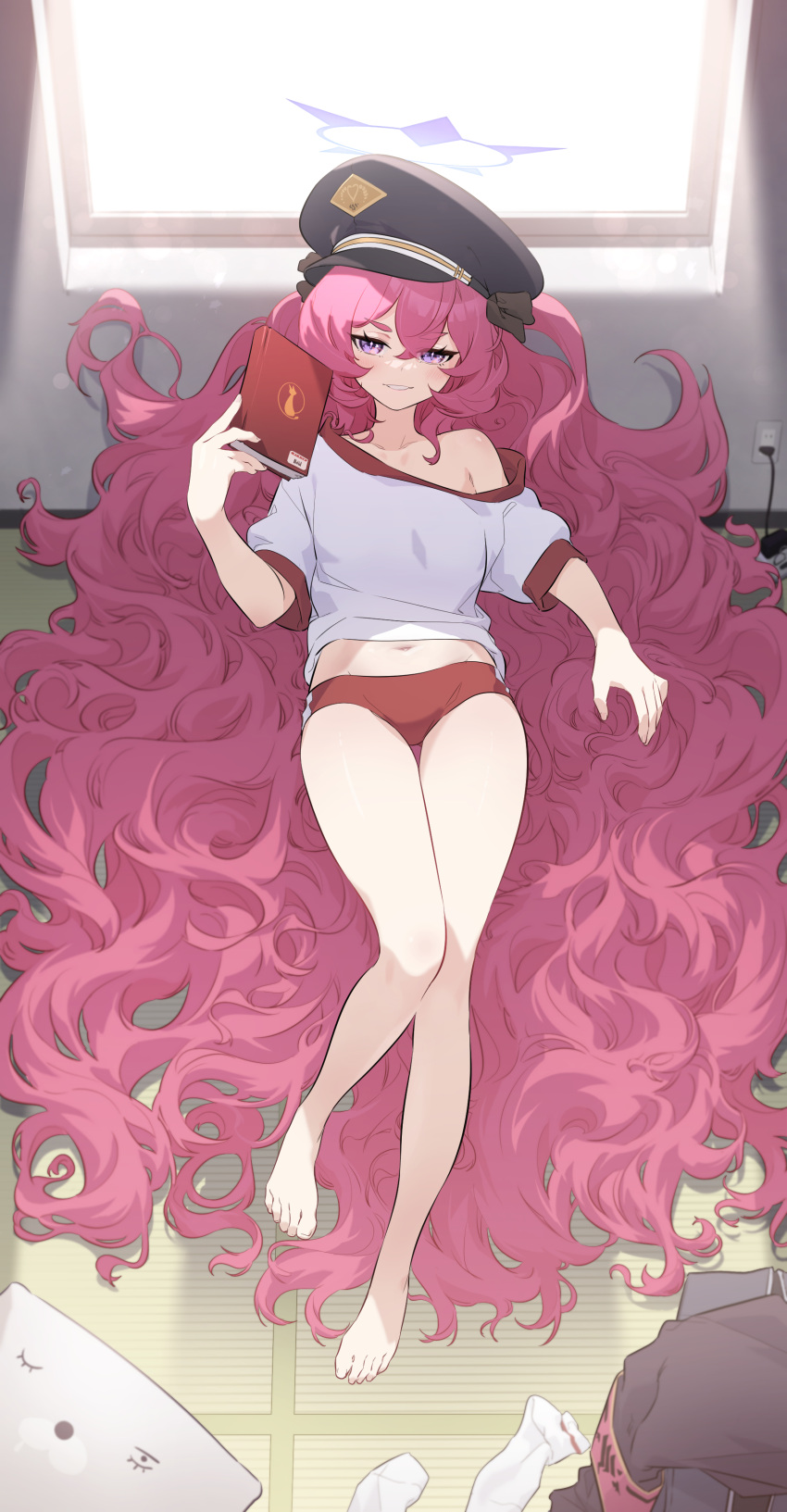 1girl absurdly_long_hair absurdres bare_legs bare_shoulders barefoot black_headwear blue_archive book buruma clothes_removed fingernails full_body gym_uniform hair_between_eyes halo hat highres holding holding_book iroha_(blue_archive) jjjsss legs long_hair looking_at_viewer lying midriff navel off-shoulder_shirt off_shoulder on_back peaked_cap pink_hair purple_eyes red_buruma shirt smile solo thigh_gap thighs toes very_long_hair window