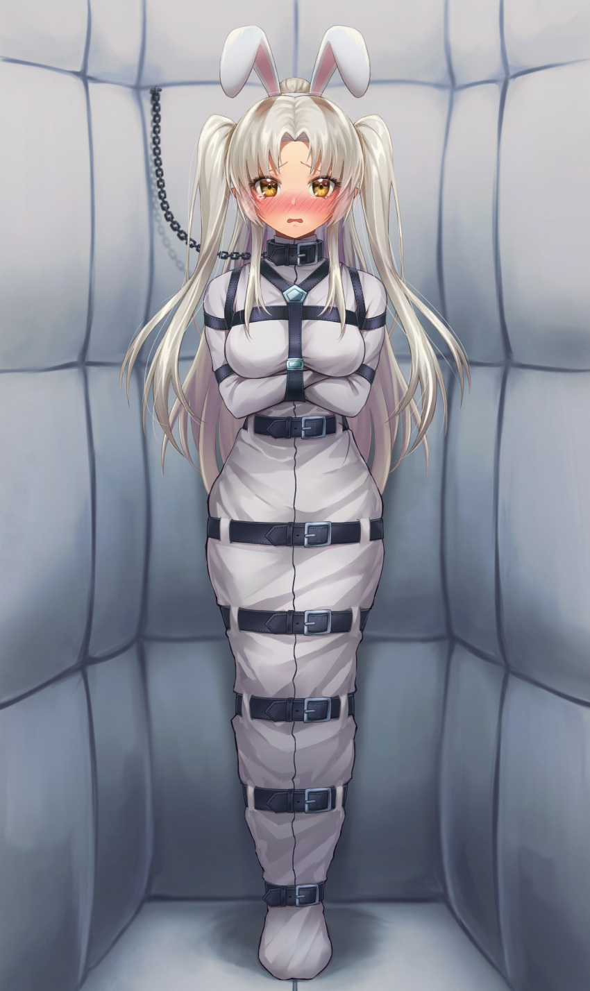 1girl absurdres animal_ears belt blonde_hair blush bound bound_arms bound_legs breasts chain collar commentary_request fake_animal_ears highres leno^a^ long_hair looking_at_viewer medium_breasts original padded_walls rabbit_ears sleepsack standing straitjacket tearing_up two_side_up yellow_eyes