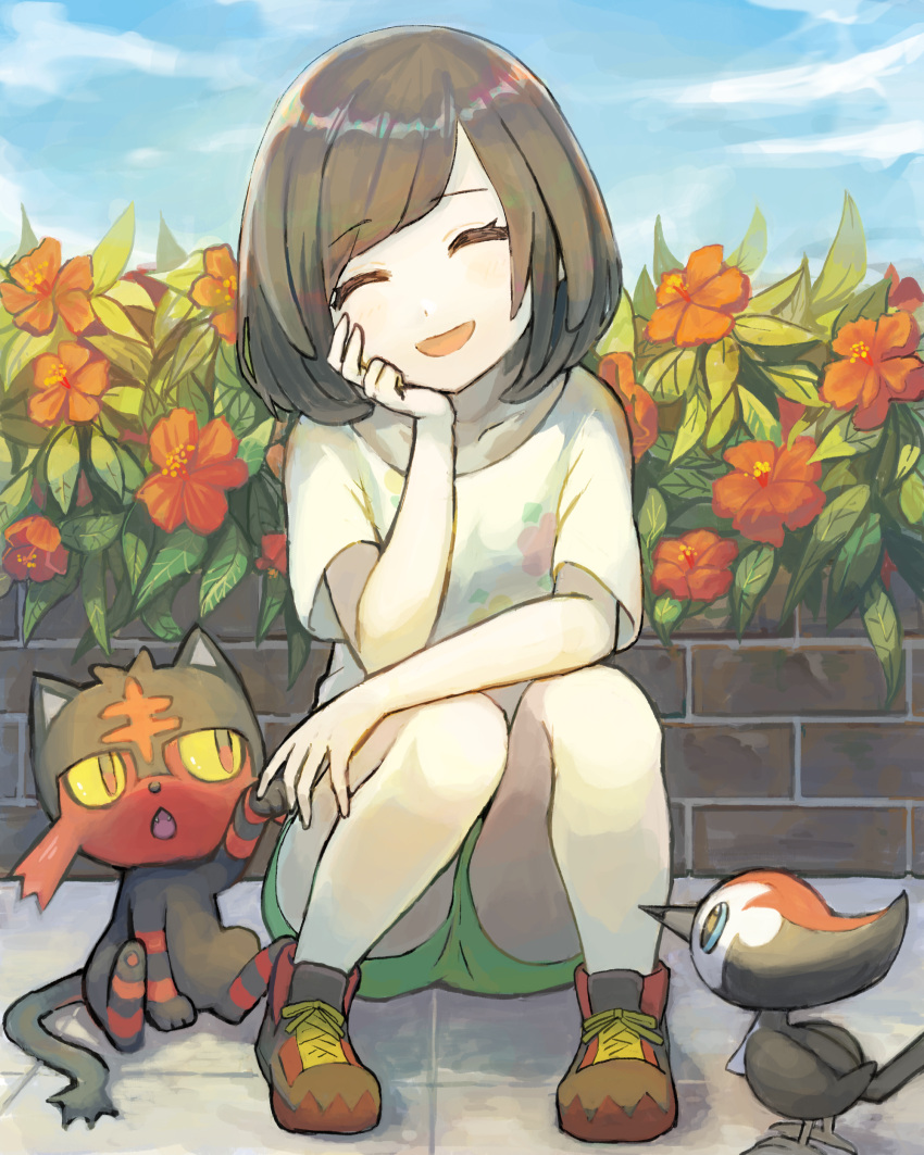 1girl absurdres black_hair blue_sky closed_eyes commentary_request day flower green_shorts hand_on_own_cheek hand_on_own_face highres knees_up litten open_mouth outdoors peppedayo_ne pikipek pokemon pokemon_(creature) pokemon_(game) pokemon_sm selene_(pokemon) shoes short_hair short_sleeves shorts sitting sky