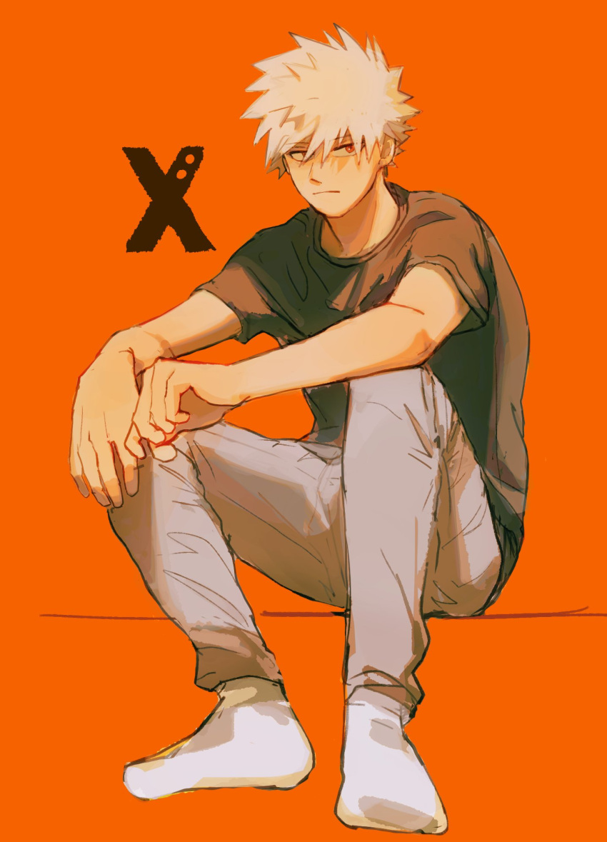 1boy bakugou_katsuki blonde_hair boku_no_hero_academia closed_mouth full_body glimrk grey_pants hair_between_eyes highres looking_at_viewer male_focus orange_background pants red_eyes shirt short_hair short_sleeves sitting socks solo spiked_hair t-shirt white_socks