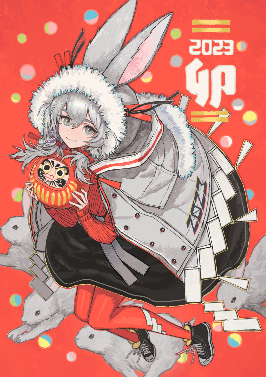 1girl 2023 black_footwear cape chinese_zodiac daruma_doll doll grey_cape grey_eyes grey_hair highres holding holding_doll long_hair long_sleeves looking_at_viewer original pantyhose rabbit red_background red_pantyhose red_sweater shoes solo sweater window1228 year_of_the_rabbit