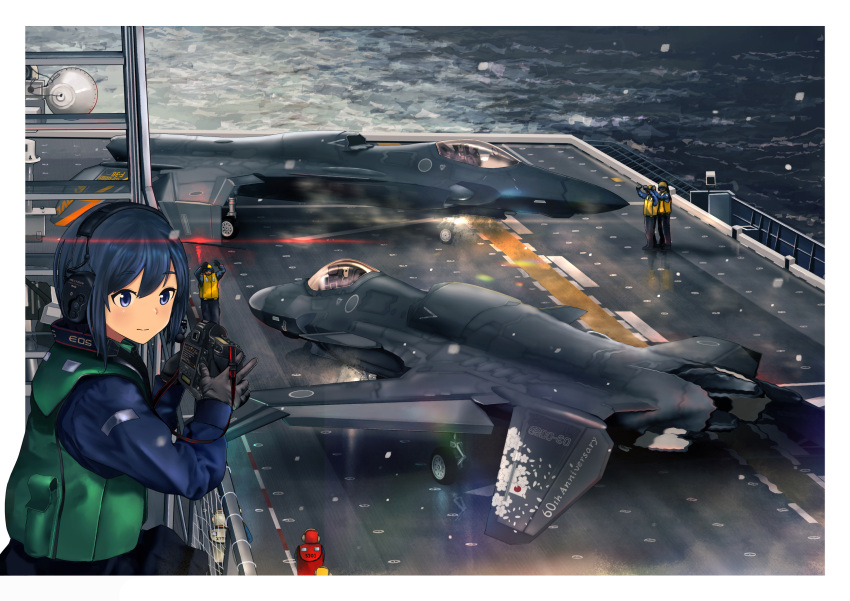 1girl 6+boys absurdres ace_combat aircraft airplane asf-x_shinden_ii bangs black_gloves black_skirt blue_eyes blue_hair blue_jacket blush border camera closed_mouth fighter_jet flight_deck gloves green_vest hair_between_eyes headphones highres holding holding_camera jacket japanese_flag jet long_sleeves military military_vehicle multiple_boys ocean short_hair skirt timmyyen vest white_border