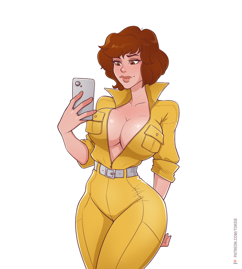 1girl april_o'neil breasts brown_hair cellphone cleavage commentary cowboy_shot english_commentary eyeshadow highres holding jumpsuit looking_at_object makeup phone red_hair short_hair simple_background smartphone solo teenage_mutant_ninja_turtles toksie yellow_jumpsuit