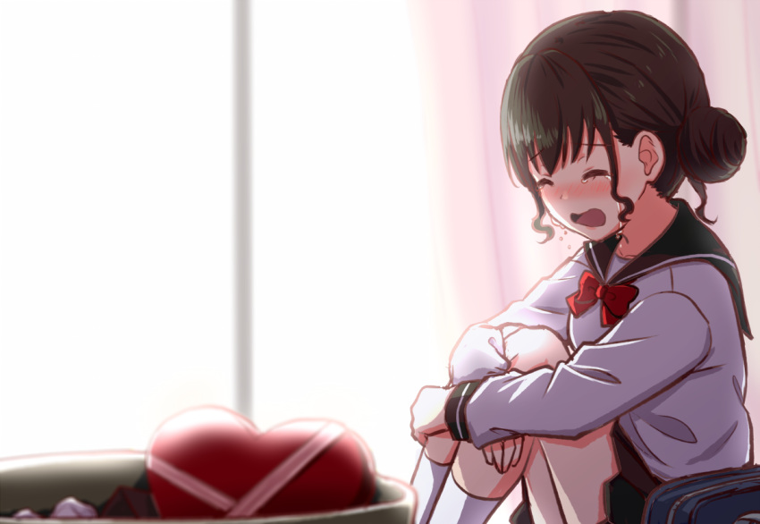 1girl bag bangs black_hair black_sailor_collar black_skirt blurry blurry_background blurry_foreground blush bow box closed_eyes commentary_request crying curtains day depth_of_field engiyoshi feet_out_of_frame gift gift_box hair_bun heart-shaped_box hugging_own_legs indoors knees_up nose_blush open_mouth original pleated_skirt red_bow sailor_collar school_bag school_uniform serafuku shirt sidelocks skirt socks solo sunlight trash_can valentine wavy_mouth white_shirt white_socks window