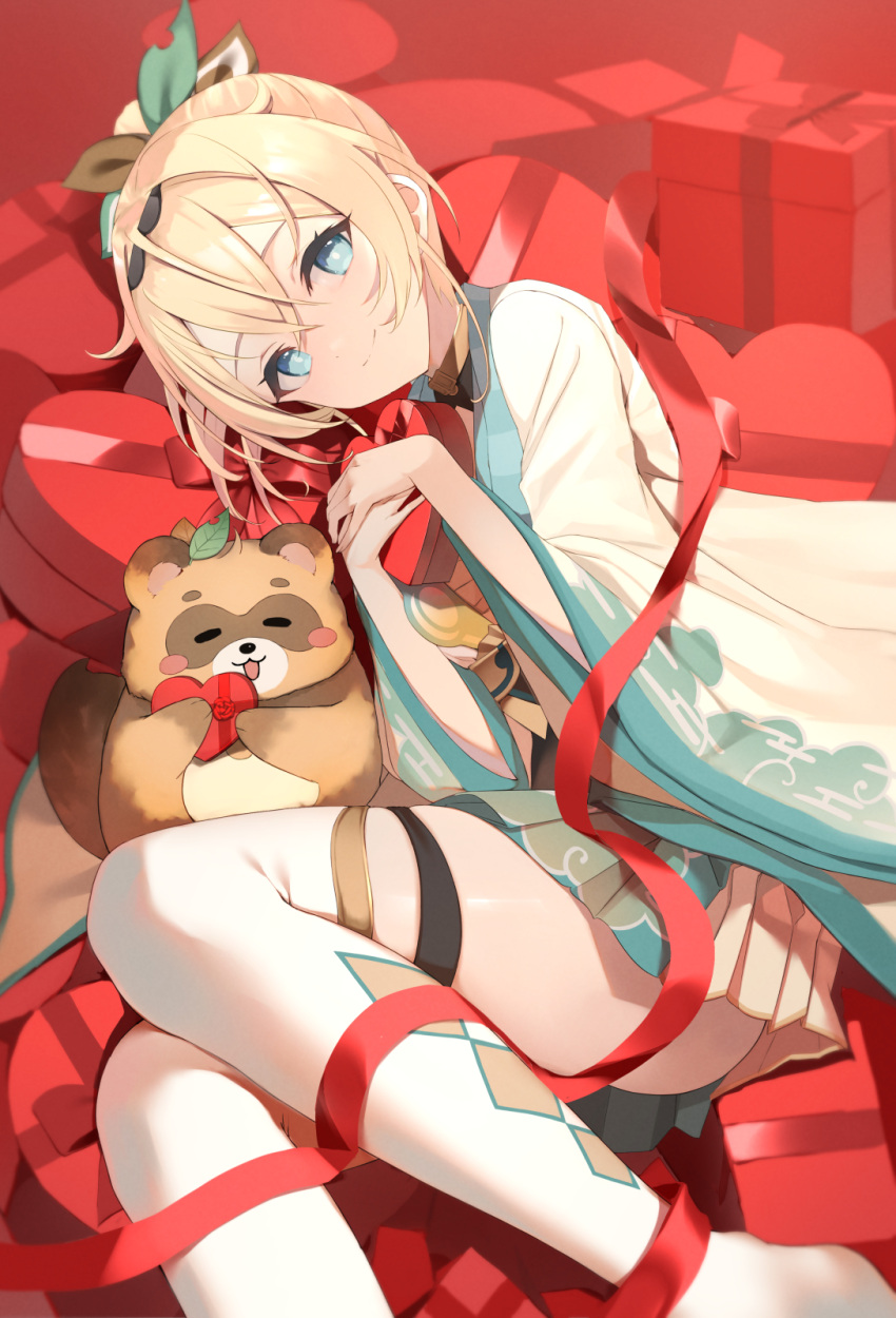 1girl bangs blonde_hair blue_eyes blue_skirt box closed_eyes closed_mouth cowengium crossed_bangs eyelashes feet_out_of_frame gift grey_skirt hair_between_eyes hair_ornament haori heart heart-shaped_box highres hololive japanese_clothes kazama_iroha leaf_hair_ornament looking_at_viewer lying miniskirt multicolored_clothes multicolored_skirt object_hug on_side open_mouth pleated_skirt pokobee print_skirt red_ribbon ribbon sidelocks skirt smile solo thighhighs valentine virtual_youtuber white_thighhighs wide_sleeves