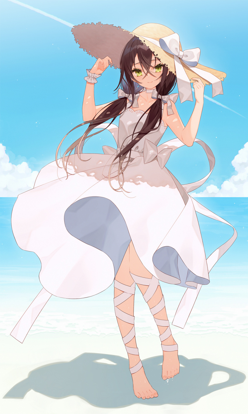 1girl barefoot beach blue_sky blush bow breasts brown_hair closed_mouth cloud cloudy_sky commentary crossed_bangs dress english_commentary eyelashes feet flat_chest full_body green_eyes hair_bow hair_ribbon hands_up hat hat_ribbon highres knees_together_feet_apart long_hair looking_at_viewer minasenagi ocean original outdoors ribbon scrunchie shadow sidelocks sky sleeveless sleeveless_dress smile solo standing straw_hat sun_hat toenails toes white_dress white_ribbon wrist_scrunchie