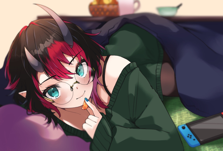 1girl alternate_costume black-framed_eyewear black_hair blanket blue_eyes blurry blurry_background blush bowl breasts brown_pantyhose closed_mouth commentary_request cup demon_girl demon_horns feet_out_of_frame food fruit glasses green_sweater highres horns kotatsu long_sleeves looking_at_viewer multicolored_hair nanashi_inc. nintendo_switch off_shoulder orange_(fruit) orange_slice pantyhose pillow pointy_ears red_hair round_eyewear ryugasaki_rene short_hair smile solo sugar_lyric sweater table two-tone_hair under_kotatsu under_table virtual_youtuber zono_(inokura_syuzo029)