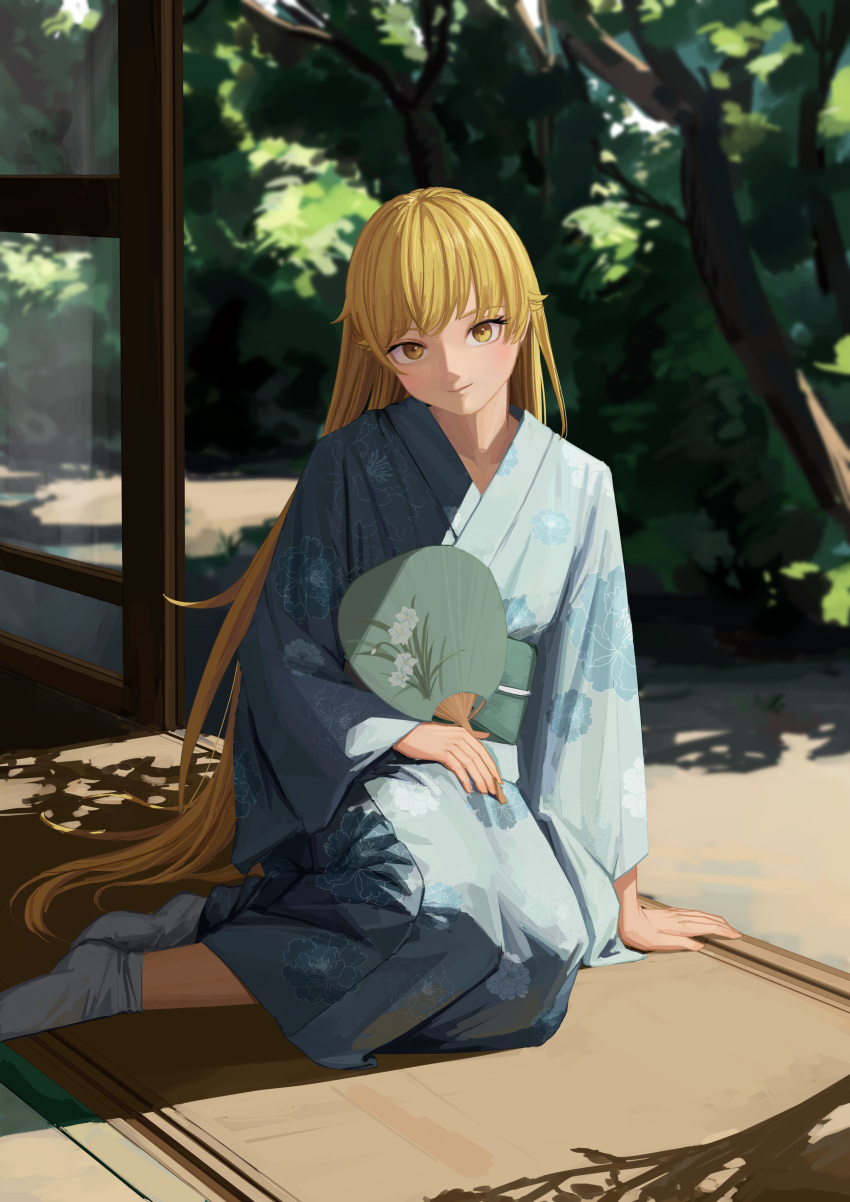 1girl absurdres blonde_hair blue_kimono blue_socks closed_mouth day hand_fan highres japanese_clothes kimono long_hair looking_at_viewer monogatari_(series) nemo_ringo oshino_shinobu outdoors smile socks solo tree yellow_eyes