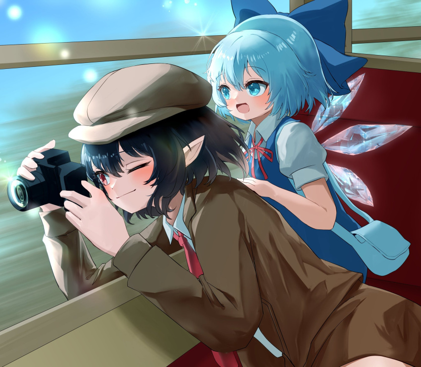 2girls black_hair blue_bow blue_dress blue_hair bow brown_coat brown_headwear camera cirno coat collared_shirt commentary_request dress fairy hair_bow hat highres holding holding_camera ice ice_wings long_sleeves mikan_(manmarumikan) multiple_girls necktie pointy_ears red_necktie shameimaru_aya shameimaru_aya_(newsboy) shirt short_hair short_sleeves touhou white_shirt wings
