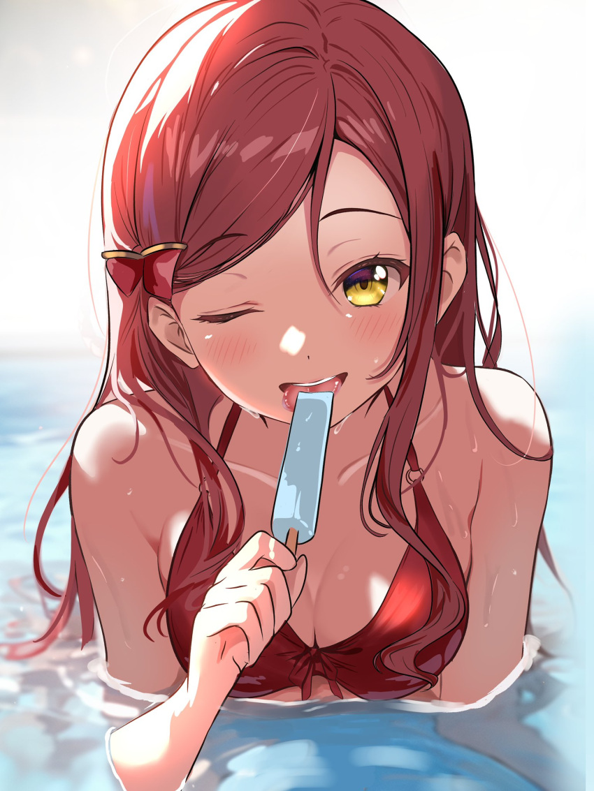 1girl bikini blush borgbutler breasts dark_red_hair eating food hair_ornament highres holding holding_food holding_popsicle long_hair looking_at_viewer love_live! love_live!_sunshine!! medium_breasts one_eye_closed partially_submerged popsicle red_bikini sakurauchi_riko smile solo swimsuit upper_body yellow_eyes