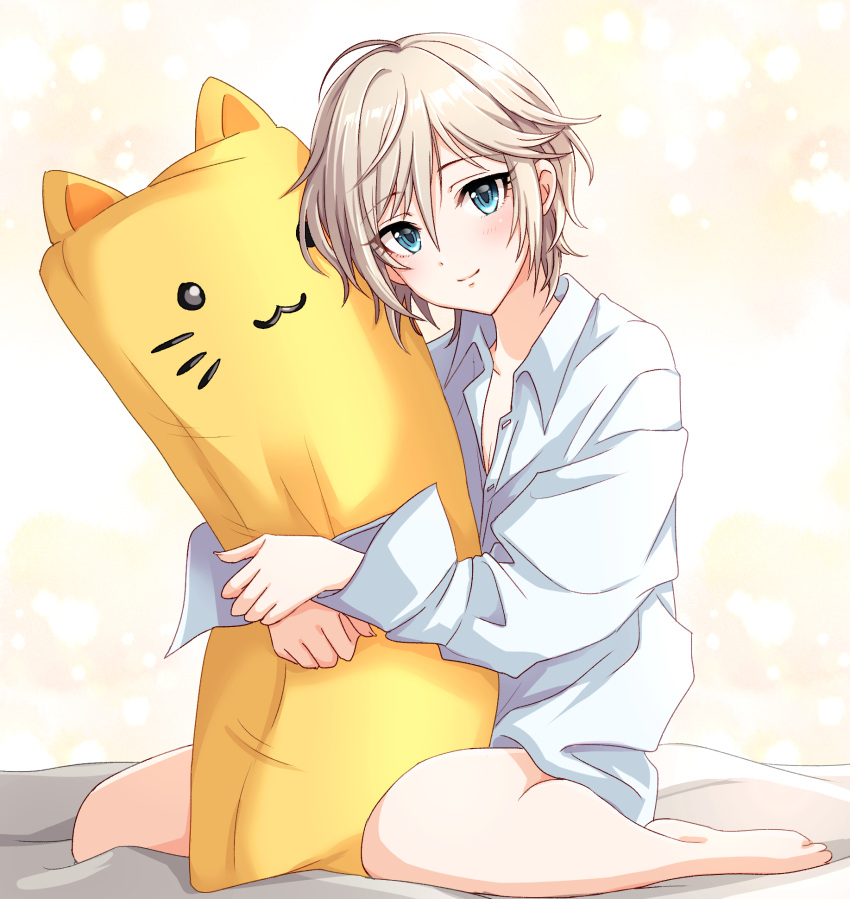 1girl anastasia_(idolmaster) bed_sheet blue_eyes body_pillow commentary eyelashes highres holding holding_pillow idolmaster idolmaster_cinderella_girls light_blush long_sleeves looking_at_viewer messy_hair on_bed oversized_clothes oversized_shirt pillow popon_ta shirt short_hair simple_background sitting smile solo wariza white_hair white_shirt