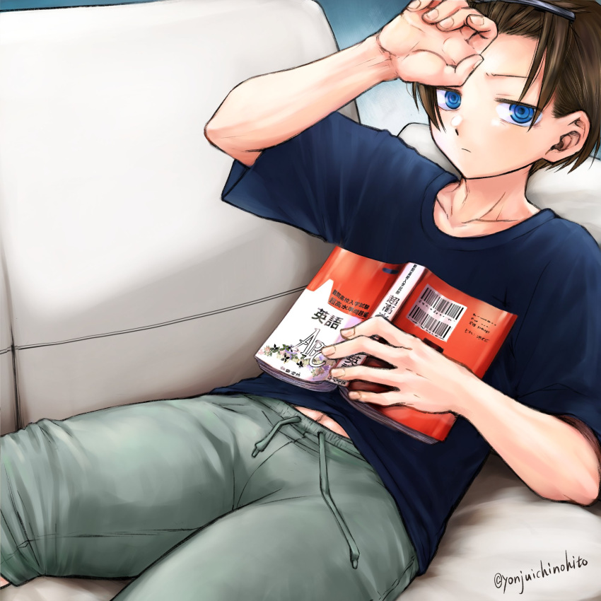 1boy arm_up blue_skirt boku_no_kokoro_no_yabai_yatsu book brown_hair closed_mouth collarbone couch forehead green_shorts hand_on_own_forehead highres holding holding_book ichikawa_kyoutarou looking_at_viewer lying navel on_back on_couch ringed_eyes shijuuichi short_hair shorts skirt solo twitter_username