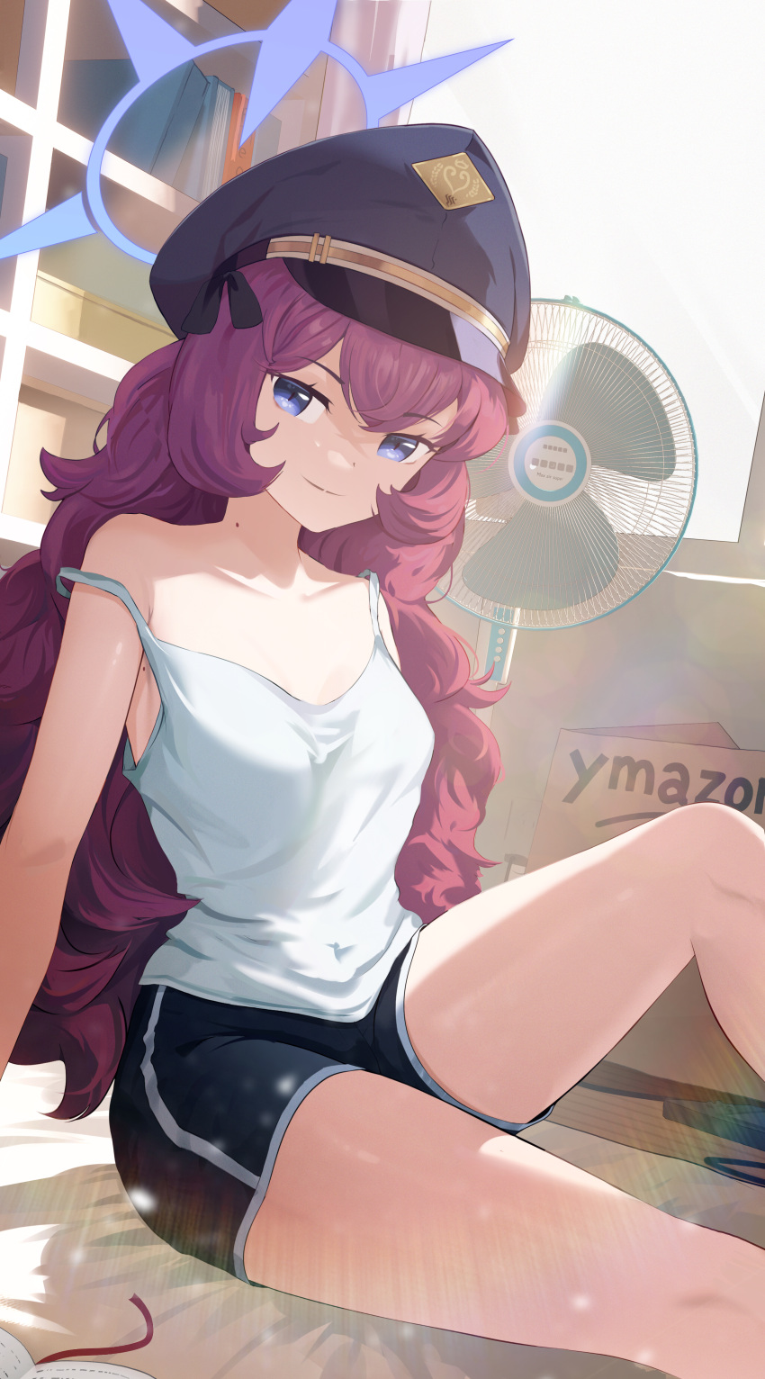 1girl absurdres amazon_(company) bare_arms bare_legs bare_shoulders black_headwear black_shorts blue_archive blue_eyes blush box brand_name_imitation breasts camisole closed_mouth collarbone feet_out_of_frame hair_between_eyes halo hat highres indoors iroha_(blue_archive) leg_up long_hair looking_at_viewer mole mole_on_neck off_shoulder ryeon_(bluetom1) shorts sitting smile solo spaghetti_strap strap_slip thighs white_camisole