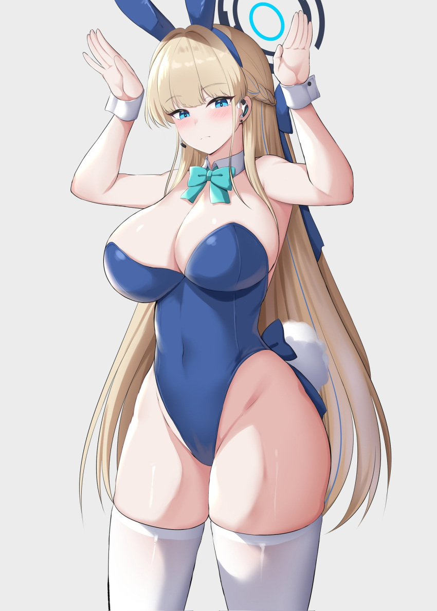 1girl animal_ears blue_archive blue_bow blue_bowtie blue_eyes blue_leotard bow bowtie breasts cleavage commentary covered_navel detached_collar fake_animal_ears fake_tail grey_background halo highleg highleg_leotard highres kisaragi_nana large_breasts leotard long_hair playboy_bunny rabbit_ears rabbit_pose simple_background solo strapless strapless_leotard tail thighhighs toki_(blue_archive) toki_(bunny)_(blue_archive) white_thighhighs wrist_cuffs