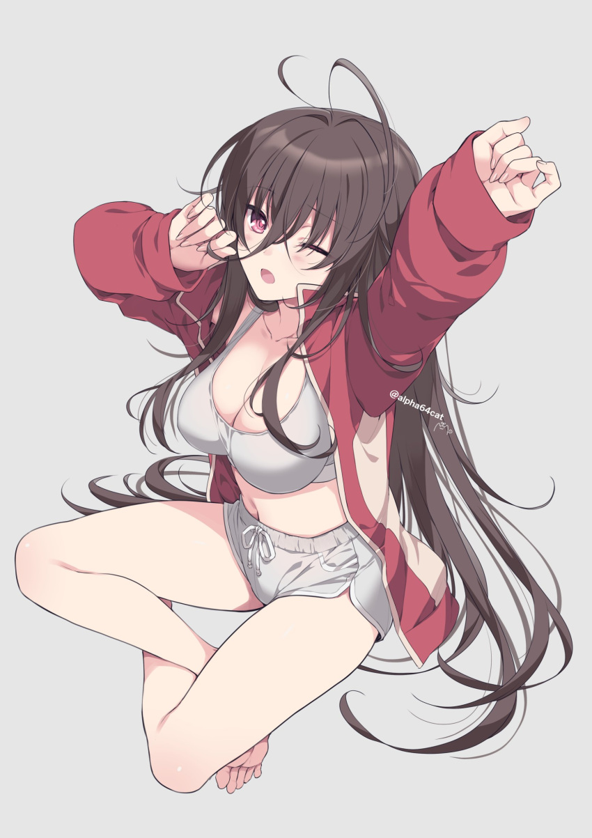 1girl absurdres ahoge alpha_(yukai_na_nakamatachi) arms_up blush breasts brown_hair cleavage hair_between_eyes highres jacket jersey large_breasts long_hair looking_at_viewer navel one_eye_closed open_mouth original red_eyes red_jacket short_shorts shorts simple_background sitting solo sports_bra sportswear