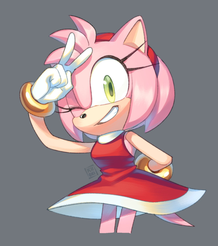 1girl amy_rose animal_ears animal_nose artist_name bare_shoulders blush bracelet breasts dress eyelashes furry furry_female gloves gold_bracelet green_eyes grey_background hairband hand_up hedgehog_ears hedgehog_girl hedgehog_tail highres jewelry kiioki11 looking_at_viewer medium_breasts one_eye_closed pink_fur red_dress red_hairband simple_background sleeveless sleeveless_dress smile solo sonic_(series) standing tail teeth v white_gloves