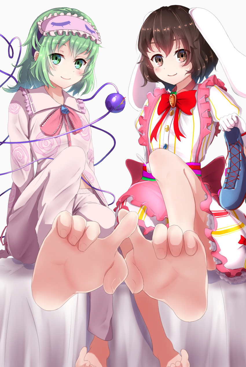 2girls alternate_costume animal_ears black_hair bow bowtie brown_eyes closed_mouth commentary_request feet floral_print green_eyes green_hair heart heart_of_string highres inaba_tewi inaba_tewi_(happy_patissiere) komeiji_koishi komeiji_koishi_(the_wandering_rose) multiple_girls pajamas pink_pajamas rabbit_ears rabbit_girl red_bow red_bowtie rose_print shimotsuki_aoi short_hair simple_background sitting sleep_mask smile soles third_eye touhou touhou_lost_word white_background