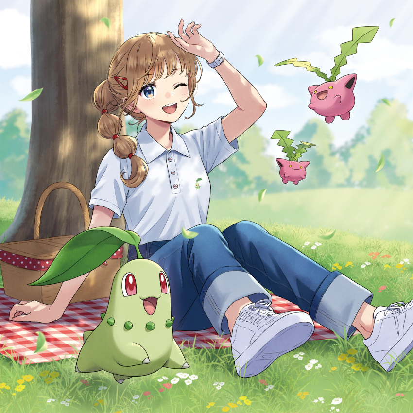 1girl ;d absurdres arm_up blanket blue_eyes blurry blurry_background character_print checkered_blanket chikorita denim flower flying grass hair_ornament hairclip highres hoppip jeans light_brown_hair light_rays long_hair merchandise morikura_en multi-tied_hair official_art one_eye_closed outdoors pants picnic picnic_basket pokemon pokemon_(creature) polo_shirt ponytail shading_eyes shirt shoes short_sleeves sitting sky smile sneakers tree watch white_footwear white_shirt wristwatch