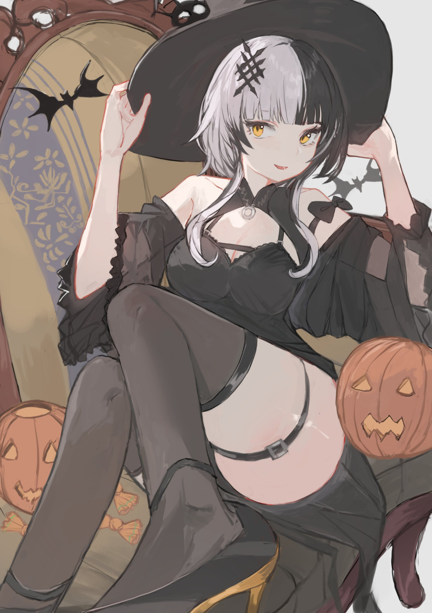 1girl absurdres bat_(animal) black_hair black_headwear breasts candy cleavage couch dimas_(dimas79756948) food grey_hair hat highres hololive hololive_english jack-o'-lantern large_breasts long_hair looking_at_viewer lower_teeth_only multicolored_hair on_couch parted_lips pumpkin shiori_novella sitting smile solo split-color_hair teeth virtual_youtuber wide_sleeves witch_hat yellow_eyes