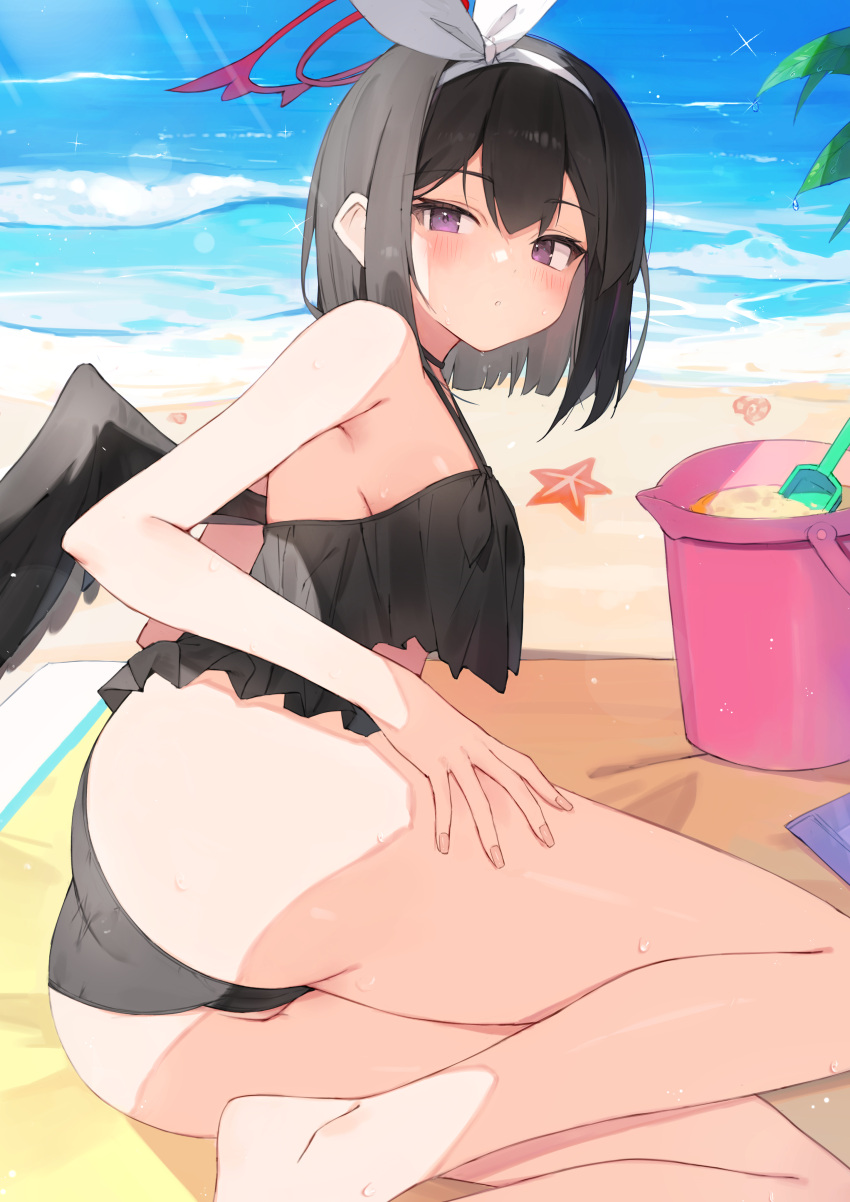 1girl absurdres ass bare_arms bare_legs bare_shoulders barefoot beach beach_mat bikini black_bikini black_choker black_hair blue_archive bucket choker day hairband halo halterneck highres looking_at_viewer mashiro_(blue_archive) mashiro_(swimsuit)_(blue_archive) mini_wings official_alternate_costume outdoors parted_lips purple_eyes short_hair sitting solo starfish string_bikini swimsuit taht_(that_is_mm) thighs water wet wings yokozuwari