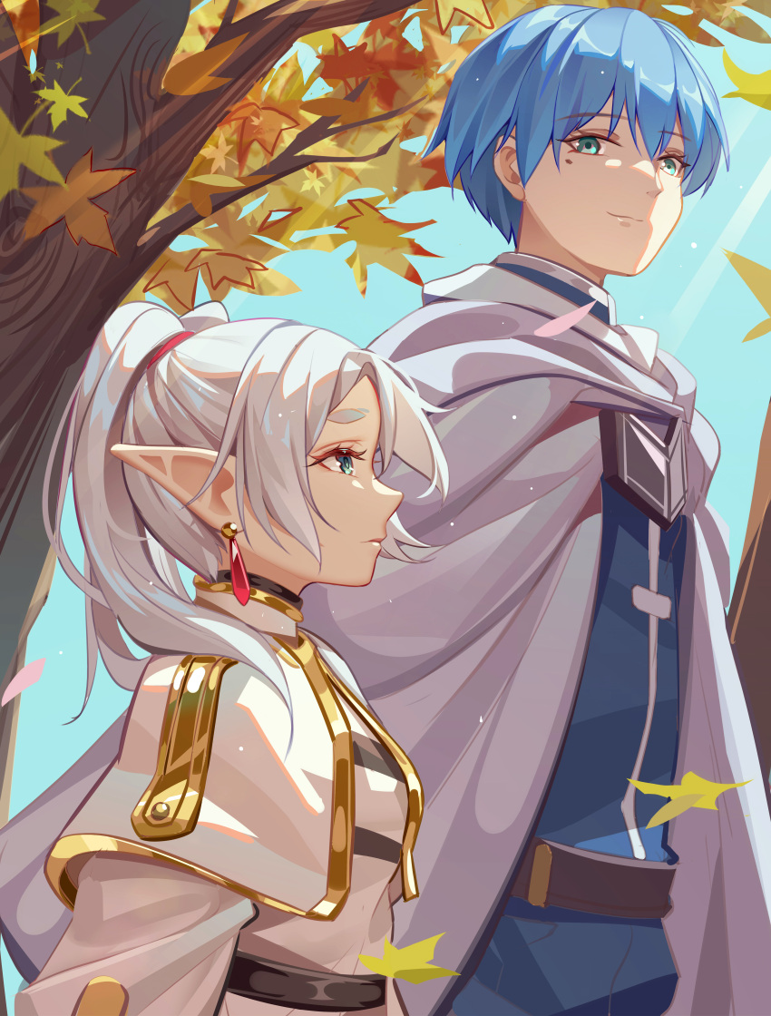 1boy 1girl absurdres autumn autumn_leaves blue_eyes blue_hair blue_jacket cape capelet closed_mouth day earrings elf frieren grey_cape hair_between_eyes hair_over_shoulder height_difference highres himmel_(sousou_no_frieren) jacket jewelry long_hair looking_at_another luai outdoors pointy_ears profile short_hair smile sousou_no_frieren standing sunlight twintails white_capelet white_hair