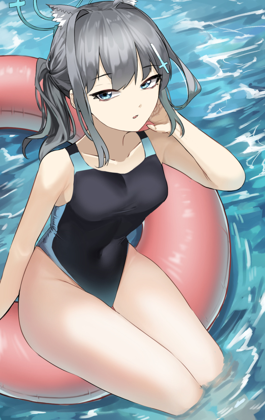 1girl animal_ear_fluff animal_ears black_one-piece_swimsuit blue_archive blue_eyes breasts competition_swimsuit covered_navel cross_hair_ornament extra_ears feet_out_of_frame grey_hair hair_ornament halo highres innertube low_ponytail medium_breasts medium_hair mismatched_pupils multicolored_clothes multicolored_swimsuit official_alternate_costume one-piece_swimsuit outerv shiroko_(blue_archive) shiroko_(swimsuit)_(blue_archive) soaking_feet solo swimsuit water wolf_ears