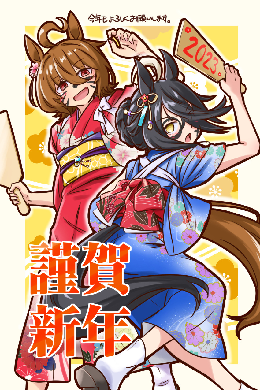 2023 2girls absurdres agnes_tachyon_(umamusume) ahoge alternate_costume alternate_hairstyle animal_ears black_hair blue_kimono brown_hair facepaint floral_print hagoita hair_bun hanetsuki happy_new_year highres holding holding_paddle horse_ears horse_girl horse_tail japanese_clothes kimono looking_at_viewer manhattan_cafe_(umamusume) multiple_girls obi open_mouth paddle punto red_eyes red_kimono sandals sash sleeves_pushed_up smile socks tabi tail translation_request umamusume white_socks yellow_eyes yukata