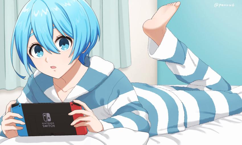 1boy barefoot bed blue_eyes blue_hair blue_lock blue_stripes highres long_sleeves male_focus nintendo_switch open_mouth pajamas panri pants pillow short_hair striped striped_hood striped_pants toes you_hiori