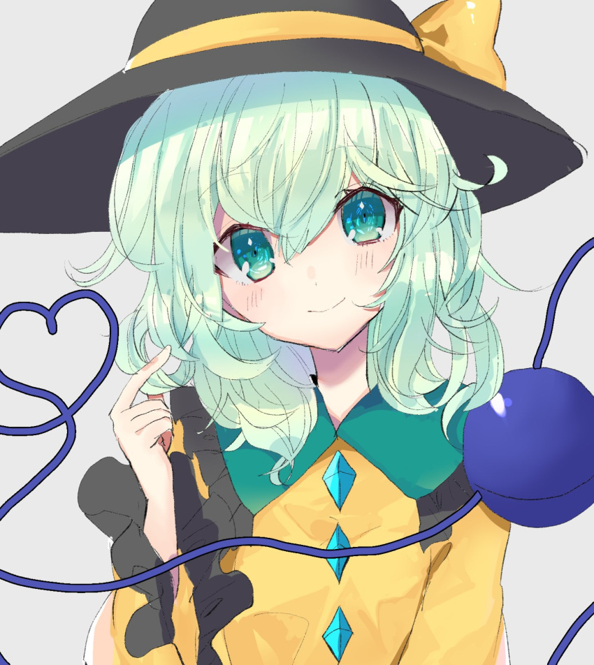 1girl aqua_eyes black_headwear blouse blush bow buttons closed_mouth diamond_button eyeball frilled_shirt_collar frilled_sleeves frills grey_background hair_between_eyes hands_up hat hat_bow hat_ribbon head_tilt heart heart_of_string highres komeiji_koishi light_green_hair long_sleeves looking_at_viewer medium_hair ribbon shirt simple_background smile solo third_eye touhou tsukikusa upper_body wavy_hair wide_sleeves yellow_bow yellow_ribbon yellow_shirt