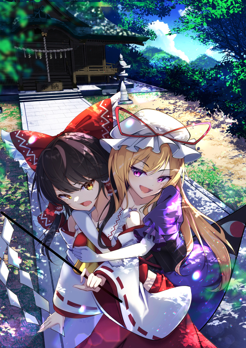 2girls absurdres blonde_hair blue_sky bow brown_hair commentary detached_sleeves dress hair_bow hakurei_reimu hakurei_shrine highres hug large_bow long_hair long_sleeves multiple_girls nontraditional_miko outdoors purple_dress purple_eyes red_bow shrine sky touhou white_headwear yakumo_yukari yamanakaume yellow_eyes