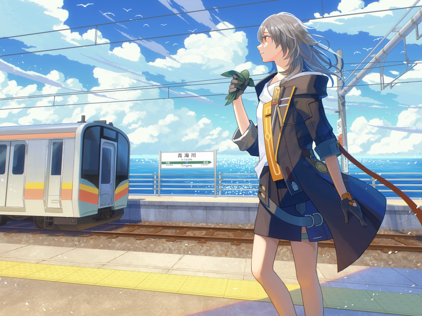 1girl absurdres animal bare_legs belt bird black_coat black_gloves blue_sky closed_mouth cloud cloudy_sky coat day dove feet_out_of_frame female_trailblazer_(honkai:_star_rail) food gloves grey_hair ground_vehicle highres hiko_(scape) holding holding_food honkai:_star_rail honkai_(series) japan long_sleeves looking_ahead medium_hair ocean open_hand outdoors railroad_tracks shirt sign sky smile solo standing thigh_strap trailblazer_(honkai:_star_rail) train train_station white_shirt wire yellow_eyes