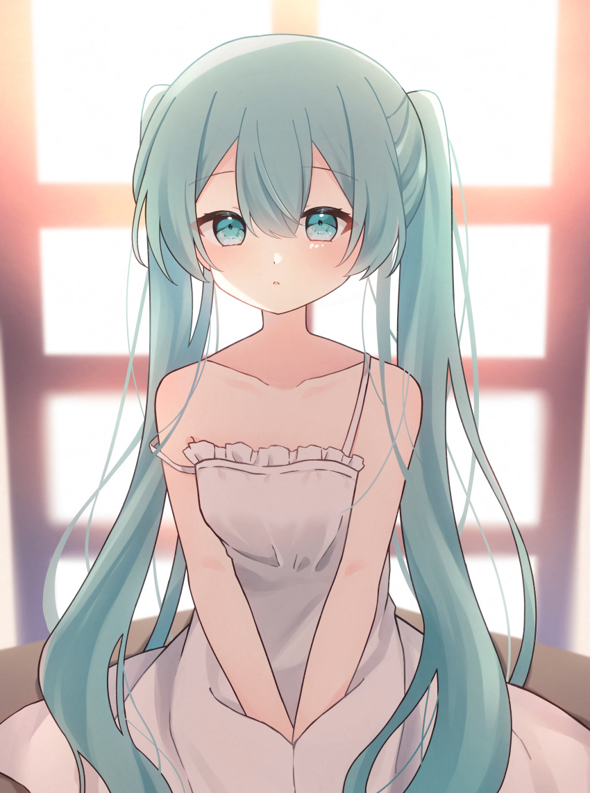 1girl absurdres arms_between_legs backlighting blue_eyes blue_hair blush chemise hatsune_miku highres long_hair looking_at_viewer parted_lips sitting solo strap_slip sunlight twintails very_long_hair vocaloid window yomiya_yumeha