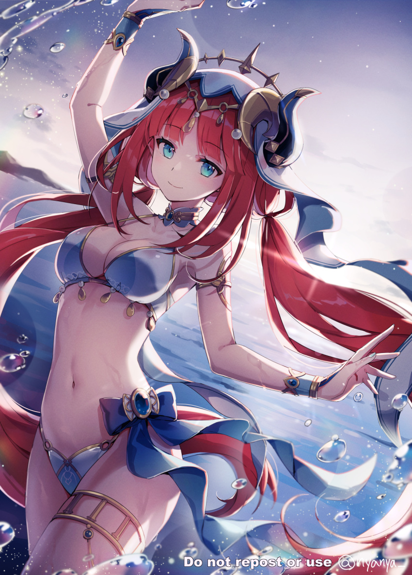 1girl arm_up bikini blue_bikini blue_eyes breasts cleavage closed_mouth cloud commentary_request fake_horns genshin_impact highres horns long_hair looking_at_viewer low_twintails medium_breasts navel nilou_(genshin_impact) nyanya outdoors red_hair sky smile solo swimsuit twintails veil very_long_hair water watermark