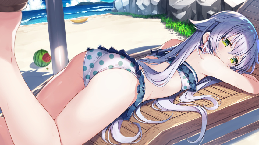 1girl absurdres altina_orion ass bare_legs bare_shoulders beach bikini commentary_request day eiyuu_densetsu food frilled_bikini frills fruit green_eyes grey_hair gurasion_(gurasion) highres long_hair looking_at_viewer lying on_stomach outdoors polka_dot polka_dot_bikini polka_dot_swimsuit sandals sen_no_kiseki swimsuit thighs watermelon