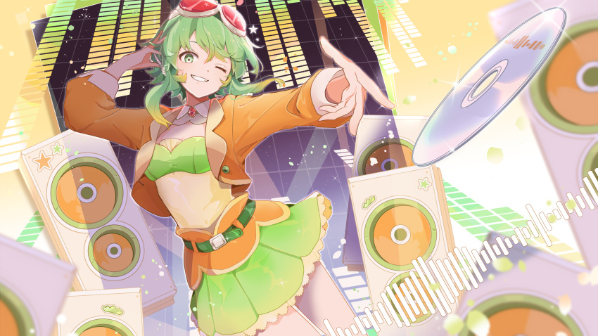 1girl absurdres brooch cd collar commentary cowboy_shot detached_collar foreshortening goggles goggles_on_head graphic_equalizer green_eyes green_hair green_skirt green_tube_top grin gumi gumi_(ai_megpoid) hand_on_headphones hand_up headphones highres jacket jewelry layered_skirt looking_at_viewer miniskirt one_eye_closed orange_jacket orange_skirt outstretched_arm pleated_skirt red_goggles shirt short_hair_with_long_locks sidelocks skirt smile solo sound_wave speaker star_(symbol) star_print strapless tube_top vocaloid wanaxtuco white_collar yellow_shirt