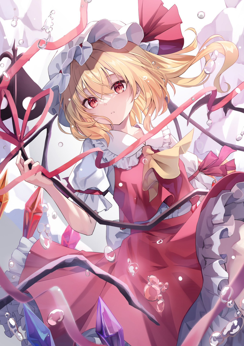 1girl ascot blonde_hair bubble commentary_request crystal feet_out_of_frame flandre_scarlet frilled_shirt_collar frilled_skirt frills hat hat_ribbon highres kure~pu laevatein_(touhou) long_hair looking_at_viewer mob_cap parted_lips puffy_short_sleeves puffy_sleeves red_eyes red_ribbon red_skirt red_vest ribbon shirt short_sleeves skirt solo touhou vest white_headwear white_shirt wings yellow_ascot