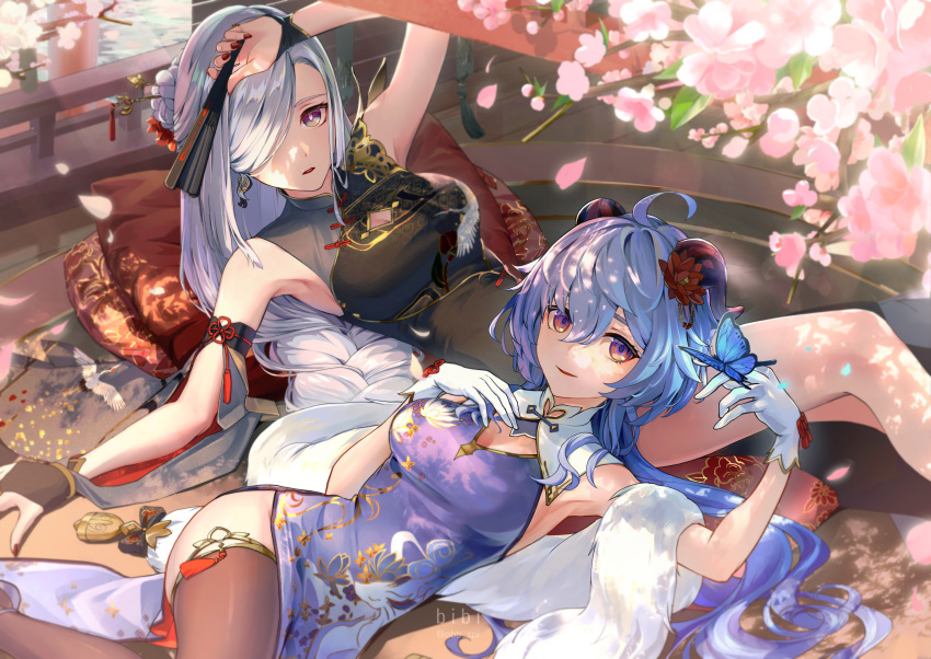 2girls absurdres ahoge alternate_costume animal_print arm_up artist_name bare_shoulders bibi_(obb_spl) bird_print black_dress black_thighhighs blue_hair braid braided_ponytail bug butterfly butterfly_on_hand cherry_blossoms china_dress chinese_clothes commentary_request dress fur_shawl ganyu_(genshin_impact) genshin_impact goat_horns grey_hair hair_over_one_eye hand_fan highres holding holding_fan horns looking_at_viewer lying multiple_girls on_back open_mouth pillow purple_dress purple_eyes red_nails shawl shenhe_(genshin_impact) sleeveless sleeveless_dress smile thighhighs white_shawl