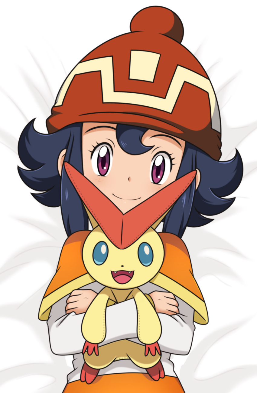 1girl beanie bed_sheet black_hair capelet character_doll closed_mouth commentary doll eyelashes hat highres holding holding_doll long_sleeves looking_at_viewer luisa_(pokemon) lying monosex on_back orange_capelet orange_skirt pokemon pokemon_(anime) pokemon_bw_(anime) pokemon_the_movie:_white/black_-_victini_and_zekrom/reshiram purple_eyes red_headwear shirt sidelocks skirt smile stitches victini white_shirt