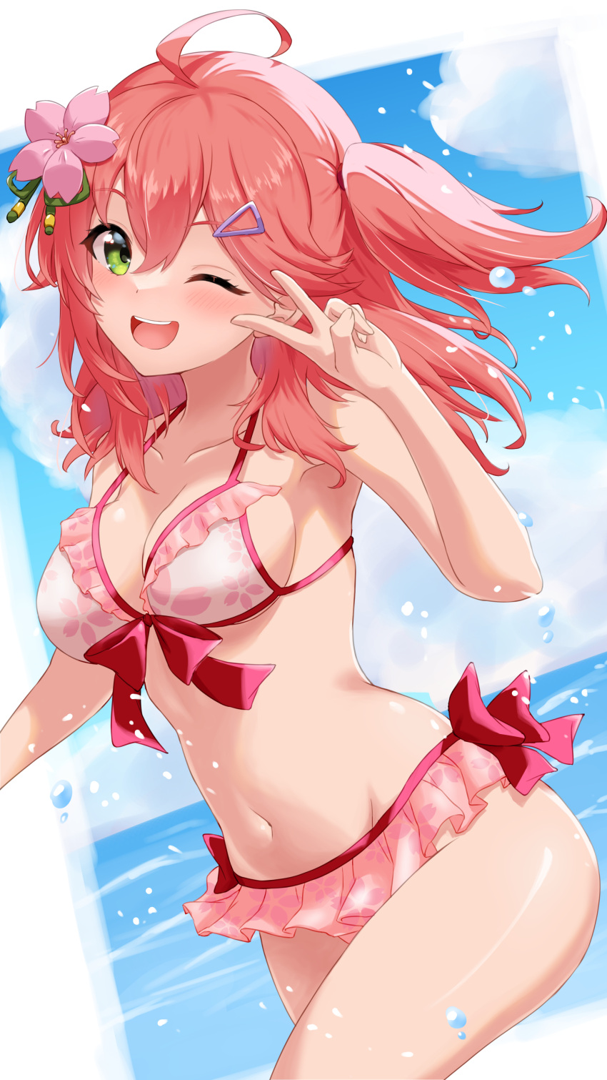 1girl absurdres ahoge bikini blue_sky blush border breasts cleavage cloud commentary floral_print flower frilled_bikini frills green_eyes hair_flower hair_ornament hairpin highres hololive looking_at_viewer medium_breasts medium_hair navel nushiya_(ayihsem) one_eye_closed open_mouth pink_bikini pink_hair sakura_miko sakura_miko_(2nd_costume) side_ponytail sky smile solo swimsuit teeth upper_teeth_only v virtual_youtuber water white_border