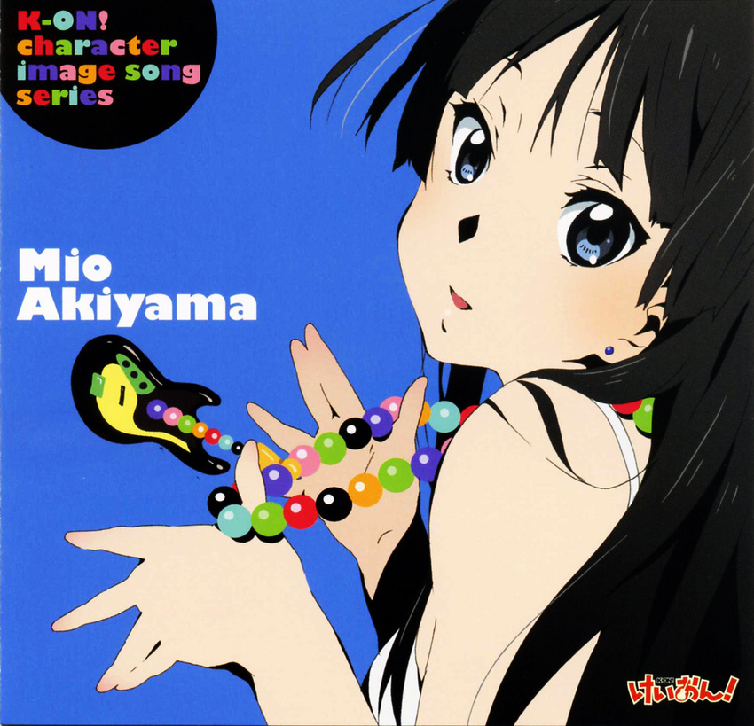 akiyama_mio album_cover artist_request black_hair cover highres k-on! official_art reference_work solo