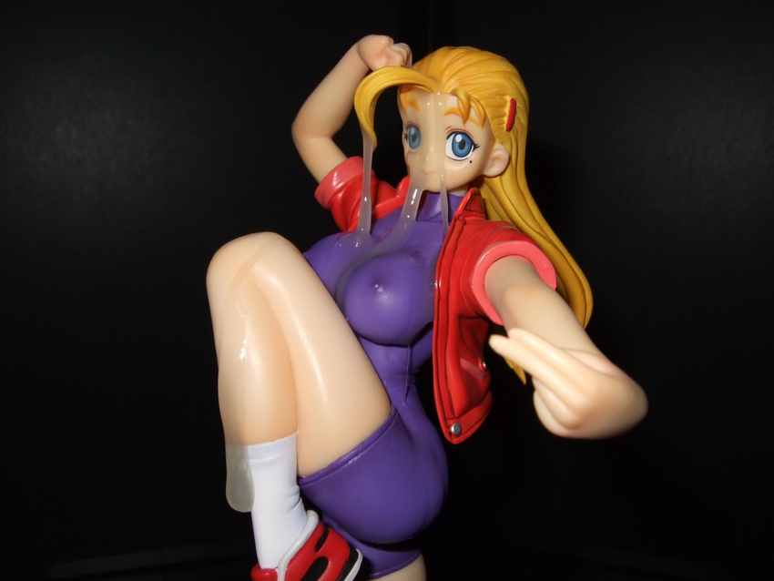 ahoge blonde_hair blue_eyes breasts covered_nipples cum fighting_stance figure furinji_miu hair_ornament hairclip highres large_breasts leg_lift long_hair mole mole_under_eye photo semen_on_figure shijou_saikyou_no_deshi_ken'ichi shoes smile sneakers socks solo unitard